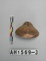 藏品(紅色夾砂單錐形陶紡輪)的圖片